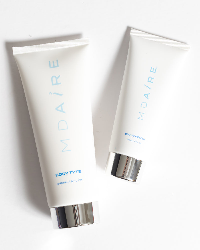 Body Glow Duo featuring Body Tyte and Cloud Polish tubes with silver caps on white background gallery position 1