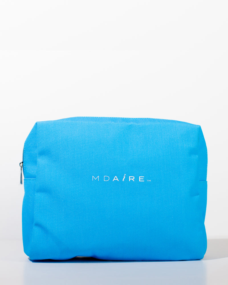 MDAiRE Cosmetic Bag in vibrant blue with logo on front, waterproof design, displayed in gallery position 1