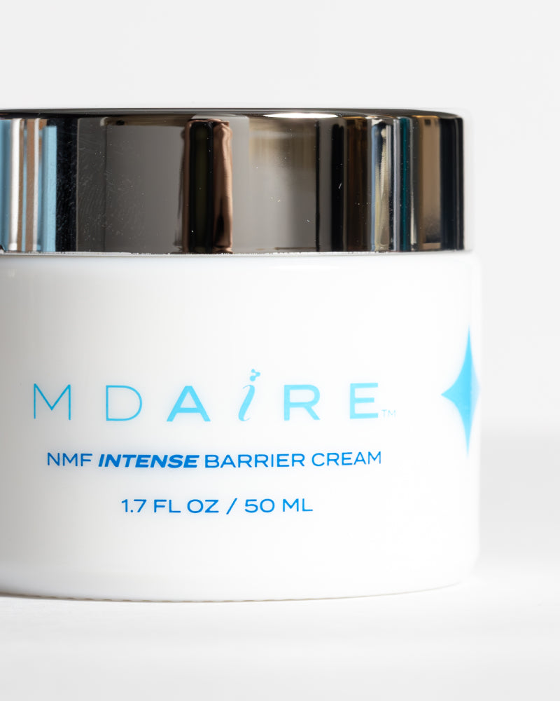 NMF Intense Barrier Cream jar with metallic lid shown close-up in gallery position 1