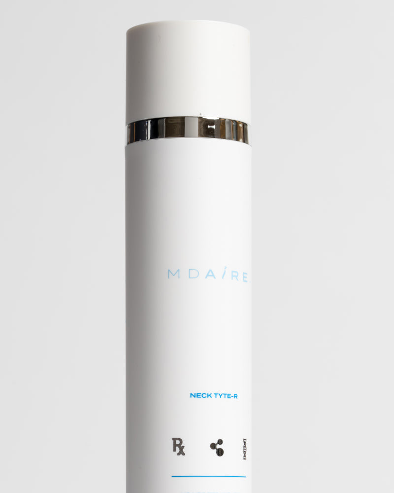 Skincare Essentials Bundle featuring tall white Neck Tyte-R bottle with silver band highlighting advanced formula gallery 1