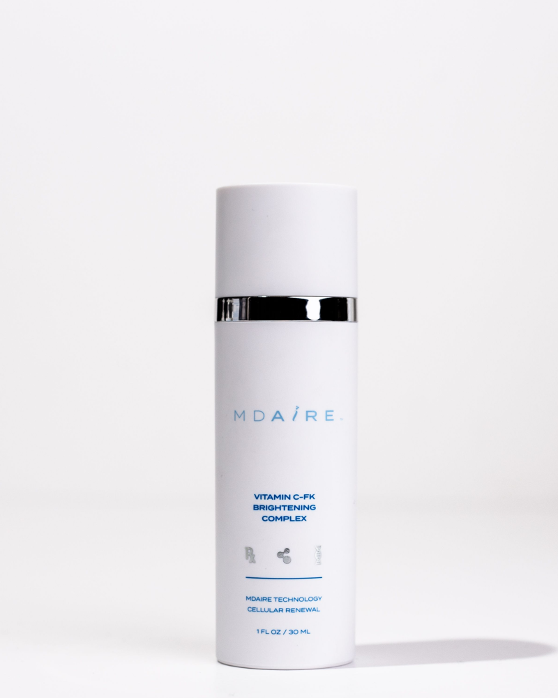 Front view of Vitamin C-FK  Brightening Complex bottle by MDAiRE in gallery position 1 with white and silver design