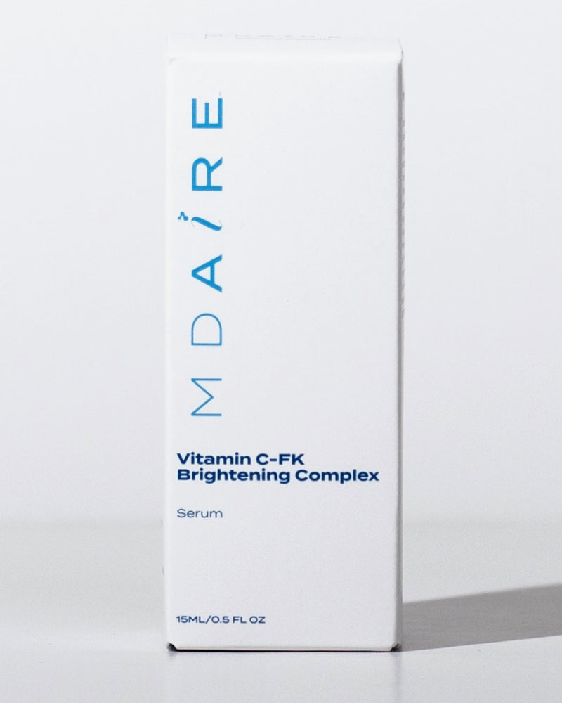 Vitamin C-FK Brightening Complex box front view in gallery position 1 with minimal white and blue design