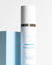 Total Protection SPF Duo featuring Mineral Fix³ white bottle with silver band against blue block gallery 1