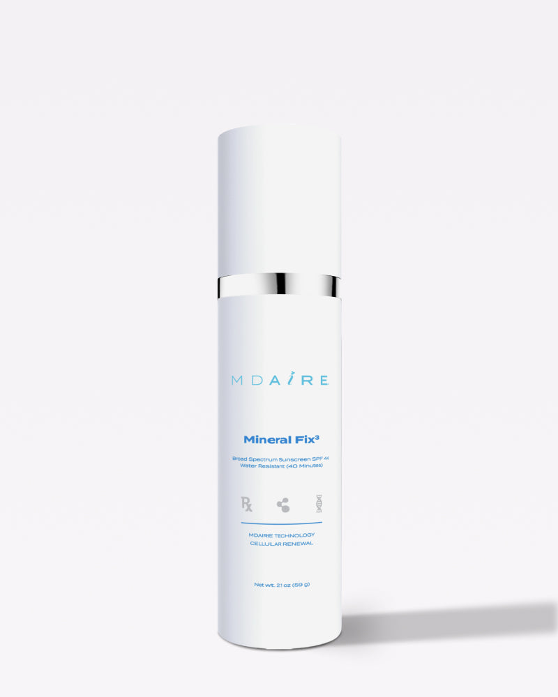 Mineral Fix³ Sunscreen bottle with silver band standing upright on white background gallery position 1