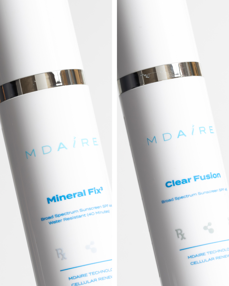 Total Protection SPF Duo showing sleek Mineral Fix³ and Clear Fusion sunscreen bottles with silver accents gallery 1